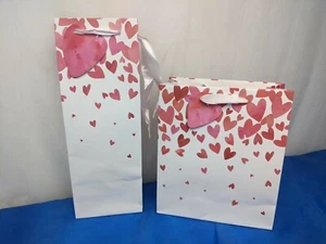 Sacchetto regalo San Valentino cuori rossi che cadono amore medio e borsa bottiglia - Foto 1 di 5