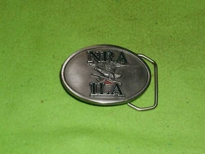 DE COLECCIÓN NUEVO FABRICANTE DE EQUIPOS ORIGINALES NRA/ILA PELTRE PULIDO DÉCADA DE 1980 CON LETRAS MULTICOLOR/HEBILLA DE BANDERA - Imagen 1 de 2