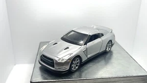 Maisto Nissan GT-R 2009 silver pull back and go toy car model Diecast scale 1/40 - Picture 1 of 16
