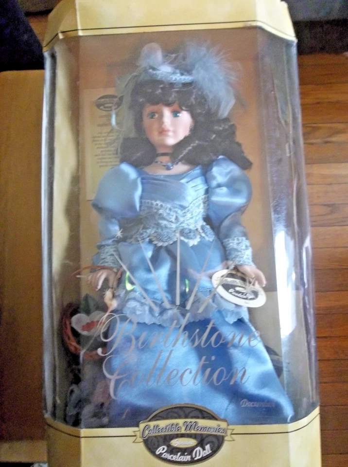 COLLECTIBLE MEMORIES GENUINE PORCELAIN DOLL:Birthstone Collection-December - Image 1 of 4