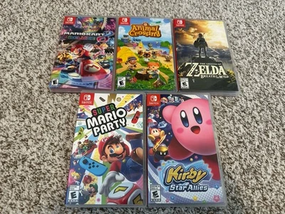 Nintendo Switch 1ª Parte Lote 5 Juegos Zelda, Kirby, Mario Kart 8 Animal Crossing Foto 1 de 3