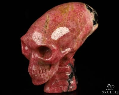 Cráneo alienígena maya alargado cristal rodonita rosa y negro de 3,6" con columna vertebral Foto 1 de 4