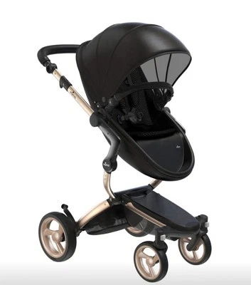 Cochecito Mima Xari Incluye Saco, Cubierta de Lluvia y Juego Extra de Ruedas Foto 1 de 3