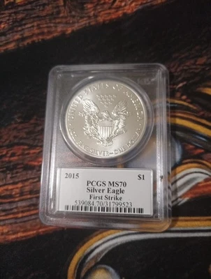 2015 $1 SILVER EAGLE PCGS MS70 FIRST STRIKE JOHN MERCANTI  EA101 - Image 1 of 2