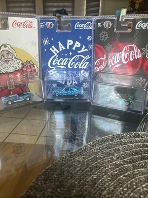 M2 Machines Coca-Cola Set 3 Cars 66 Ford MKII 69 Dart Swinger 65 Shelby Cobra - Image 1 of 4