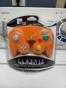 NEW IN PACKAGE - TTX Tech Wii And Gamecube Classic Controller orange  - Picture 1 of 2