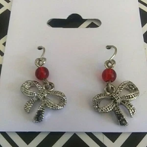 Silver dangle bow earrings with red accent bead - Picture 1 of 1