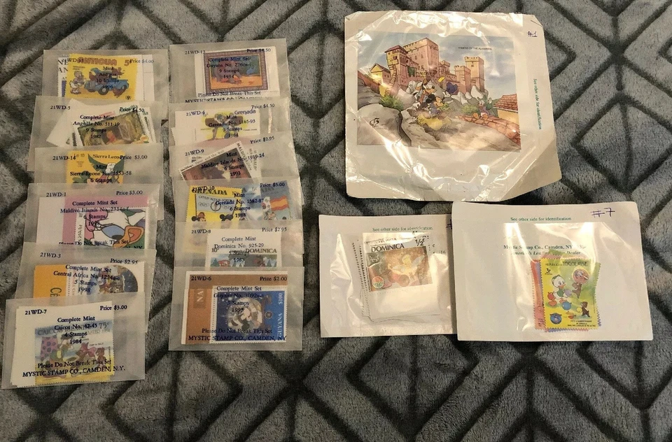 LOTE DE 95 HOJAS DE ESTAMPILLAS CLÁSICAS GRANADA DISNEY PETER PAN Foto 1 de 4