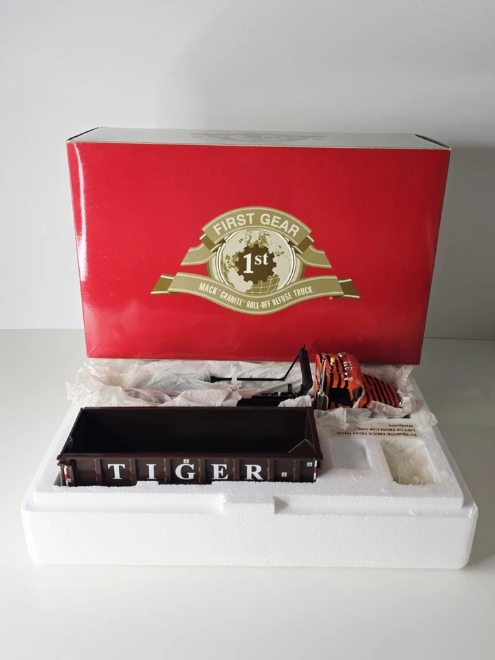 First Gear - Tiger Waste Mack Granite Roll Off Refuse Truck - 1:34 #19-3505 - Image 1 of 4