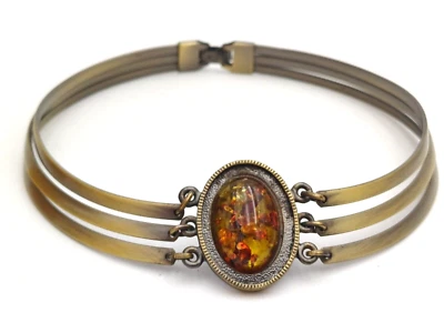 AMBRA CABOCHON GIROCOLLO SEMIRIGIDO - OVALE NATURALE - Immagine 1 di 4