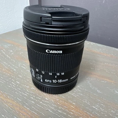 Lente zoom gran angular Canon EF-S 10-18 mm f/4,5-5,6 IS STM montura EF-S/APS-C Foto 1 de 4