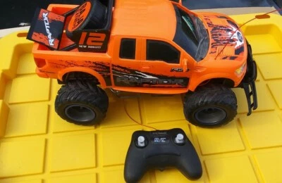 New Bright Orange Ford Raptor RC Truck w Remote - Image 1 of 4