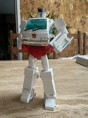 Genuine MP-30 Official Takara Masterpiece Ratchet + NONNEF Add-On - Image 1 of 4