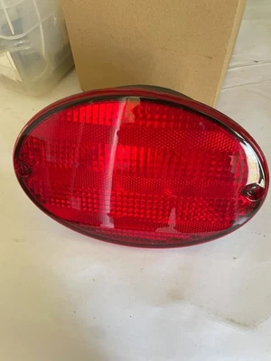 Carcasa de lámpara trasera de pasajero derecho Corvette 1997-2004 nueva GM # 16523630 Foto 1 de 2