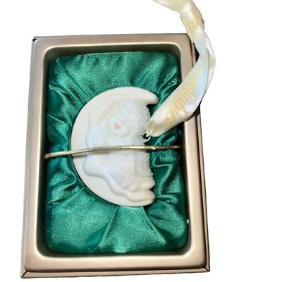 Snowbabies "ROCK-A-BYE BABY" VIII -Mini adorno de Navidad por Departamento 56 COMO NUEVO Foto 1 de 4