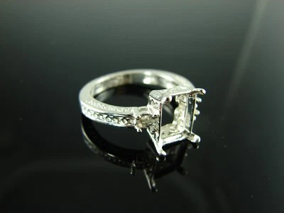 6159 Ring Setting Sterling Silver Size 7, (1) 9x7 Emerald Cut, (2) 3mm Round Gem - Image 1 of 3