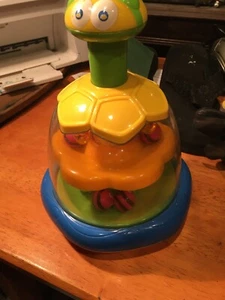 Toddler toy, balls spin, you push top, and balls spin - Picture 1 of 2