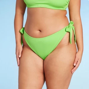 Neu mit Etikett Wild Fable freches Bikiniunterteil gerippt seitlich gebunden U-Ausschnitt vorne hohes Bein - Bild 1 von 5
