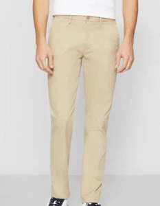 Men’s Tommy Hilfiger CORE DENTON Stretch Chinos Straight Fit in Batique Khaki - Picture 1 of 5