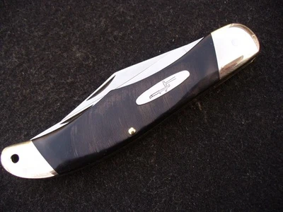 Cuchillo Trailblazer Buck 317 EE. UU. de colección corte en sierra mangos compuestos negros usado excelente+ Foto 1 de 4