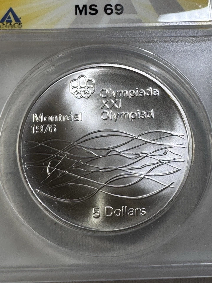 1975 Canada $5 Swimming Olympic Silver Commemorative Graded MS 69 by ANACS - Image 1 of 4