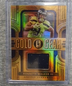 2023 Panini Gold Standard Kenneth Walker III Gold Gear /299