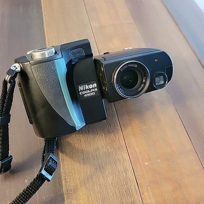 Nikon  COOLPIX  4500 Black 4 MP Swivel Camera. Tested w/Battery, no zoom READ - Image 1 of 4