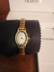 TKIIOER DAMEN UHR GOLDFARBEN ANALOG 30M WASSERDICHT EDELSTAHL STRETCH BAND - Bild 1 von 6