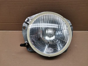 Phare  rond gauche ou droit pour volkswagen Polo de 79 a 90 !! neuf origine VW ! - Picture 1 of 4