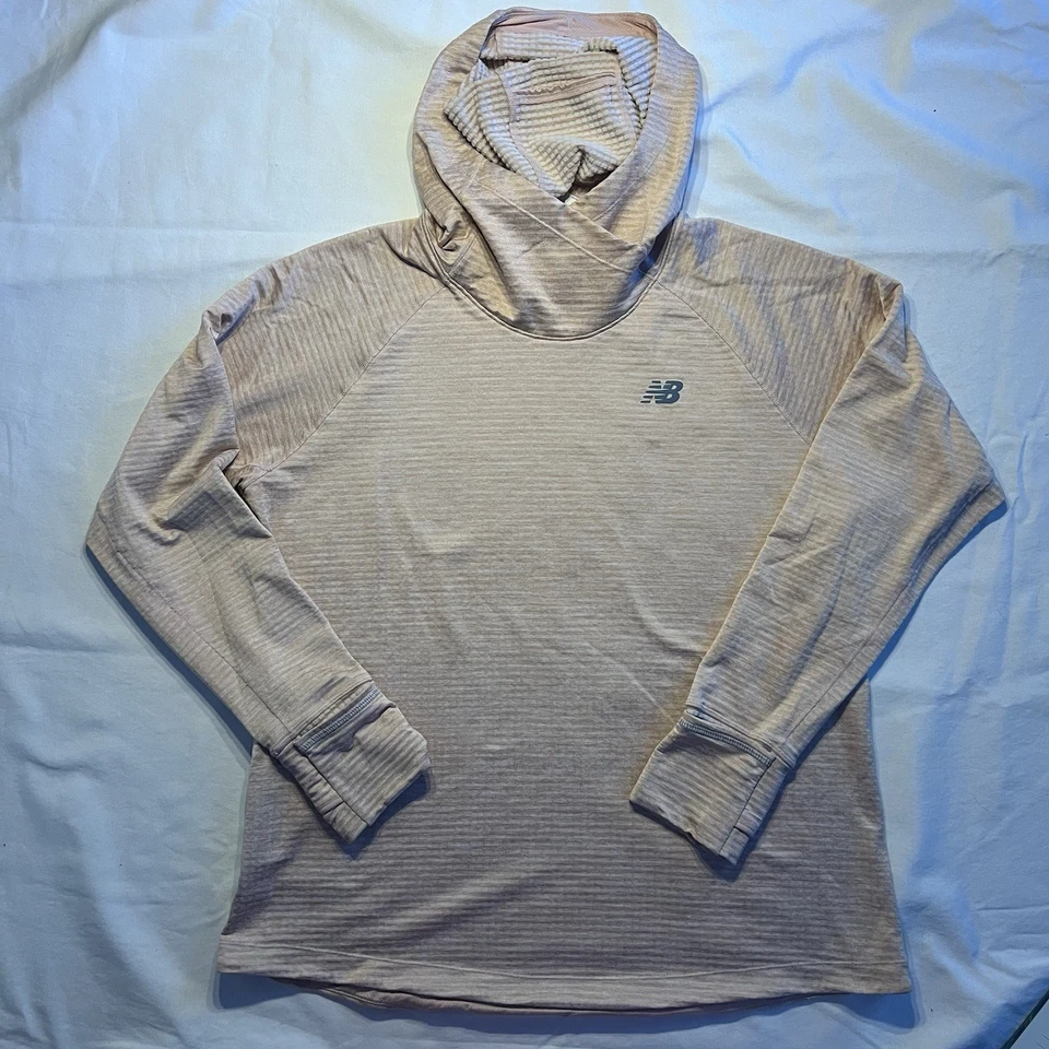 Sudadera con capucha New Balance Heat Running XL rosa apagado manga larga agujeros para los pulgares para mujer Foto 1 de 4
