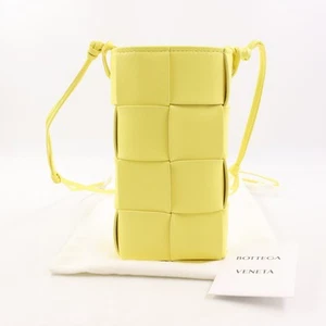 Bottega Veneta Intrecciato Leather Phone Pouch with Knotted Strap in Yellow - Picture 1 of 13