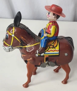 Giocattolo vintage anni 60 Plodding asino e cowboy Yone 2090 Giappone 5" - Foto 1 di 9