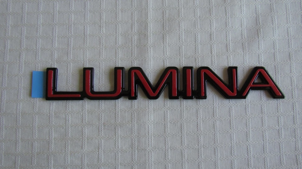 NEW OEM Red Chevy "LUMINA" Euro Nameplate Emblem Badge 10176711 - Image 1 of 1