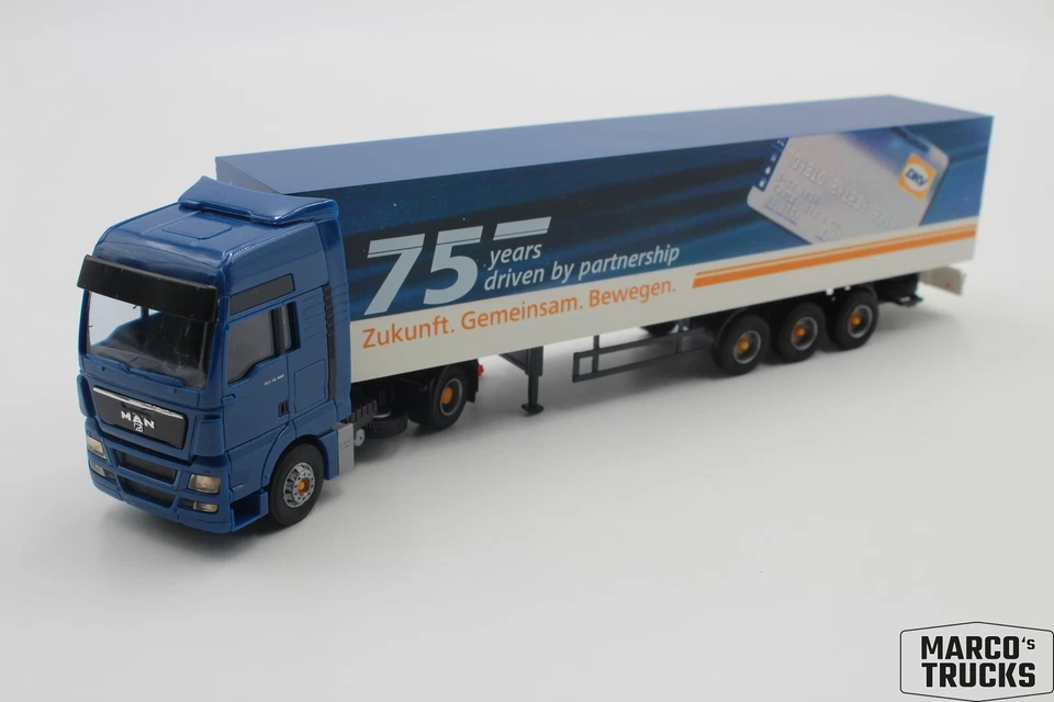 AWM MAN TGX XXL 18.480 box semi-trailer truck "75 Jahre DKV" 1:87 /AW3193 - Image 1 of 1