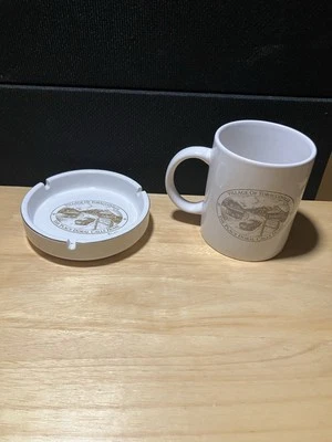 CENICERO DE CIGARRILLOS DORAL y TAZA pueblo de TOBACCOVILLE  Foto 1 de 4