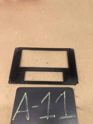 1982-1984 FIREBIRD radio bisel consola envolvente centro clima bisel transmisión AM TA Foto 1 de 4