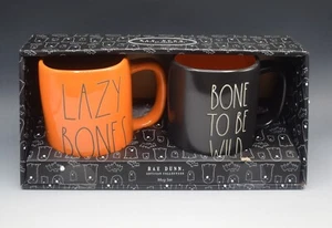 NEW RAE DUNN HALLOWEEN LAZY BONES BONE TO BE WILD SET OF 2 MUGS ORANGE BLACK - Picture 1 of 5
