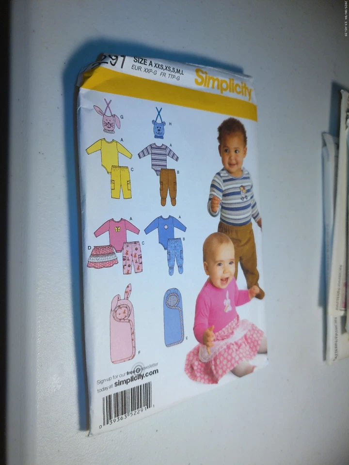 Simplicity Pattern 2291, Babies Pants, Skirt, Bodysuit, Bibs, XXS-L - Image 1 of 1