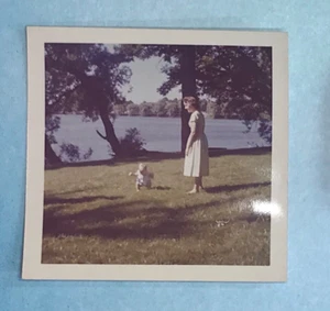 found photograph 1960s Woman in dress with baby by a lake Mother Mom Child kid - Picture 1 of 3