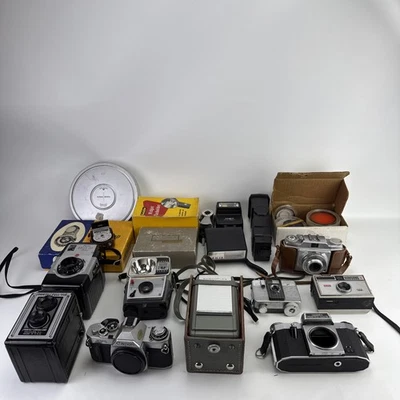 Gran Lote Cámaras y Accesorios Vintage Canon, Ansco, Expositores, Flashes Foto 1 de 4