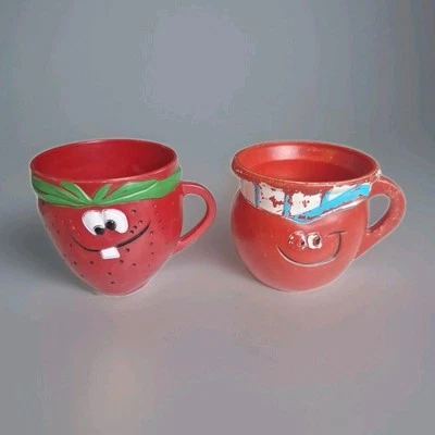 2 tazas vintage 1969 Pillsbury cara divertida fresa peca cara ChooChoo cereza Foto 1 de 4