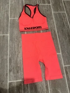LOVE & SPORTS NEON ORANGE BIKE SHORTS AND SPORTS BRA OUTFIT SET - Picture 1 of 2