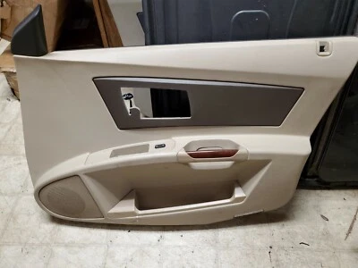 2003 2004 2005 2006 2007 CADILLAC CTS RIGHT FRONT INTERIOR DOOR PANEL TAN - Image 1 of 3