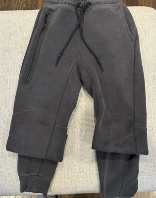 Pantalones deportivos Nike para hombre XS grises con logotipo Swoosh Foto 1 de 4