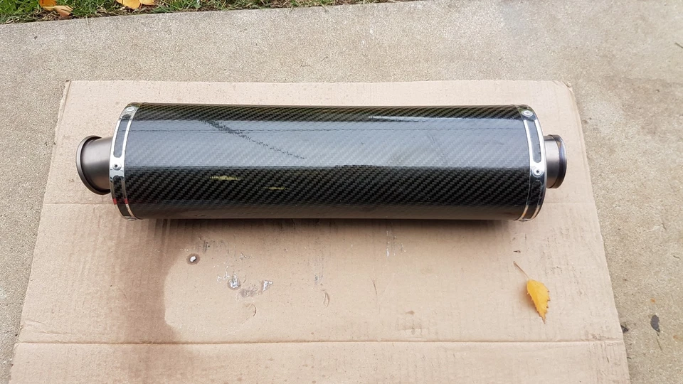 Universal Carbon Fiber oval muffler with Titanium ends under seat design - image 1 of 2