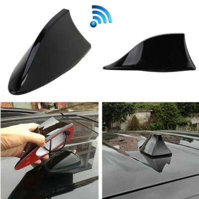 Antena aérea de señal AM/FM negra inalámbrica estilo aleta de tiburón para techo de auto Foto 1 de 4