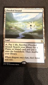 Flooded Strand Khan Of Tarkir Regular, NM - Picture 1 of 2