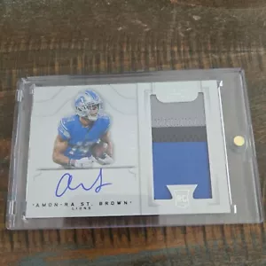 Amon-Ra St.brown /99 RC 3 Color Patch RPA 2021 Panini National Treasure - Bild 1 von 1