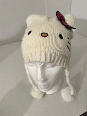 Gorro blanco tejido Hellow Kitty con orejas, lazo rosa y borlas trenzadas Foto 1 de 4