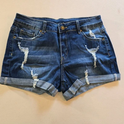 Pantalones cortos de jean desgastados para mujer pequeños azules lavado mediano Foto 1 de 4